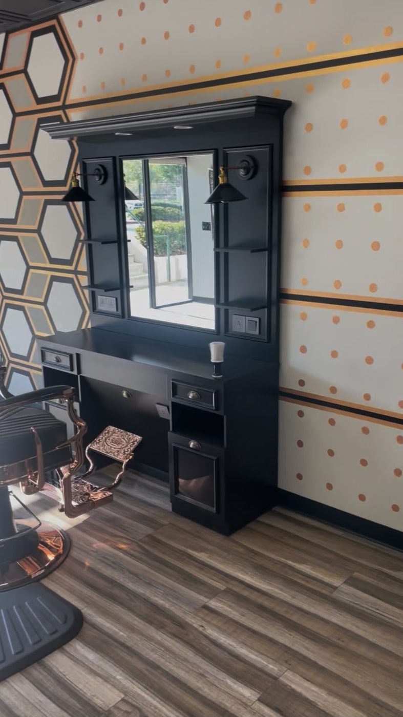 Mirror station and rose-gold chair at Fathers Barber Salon