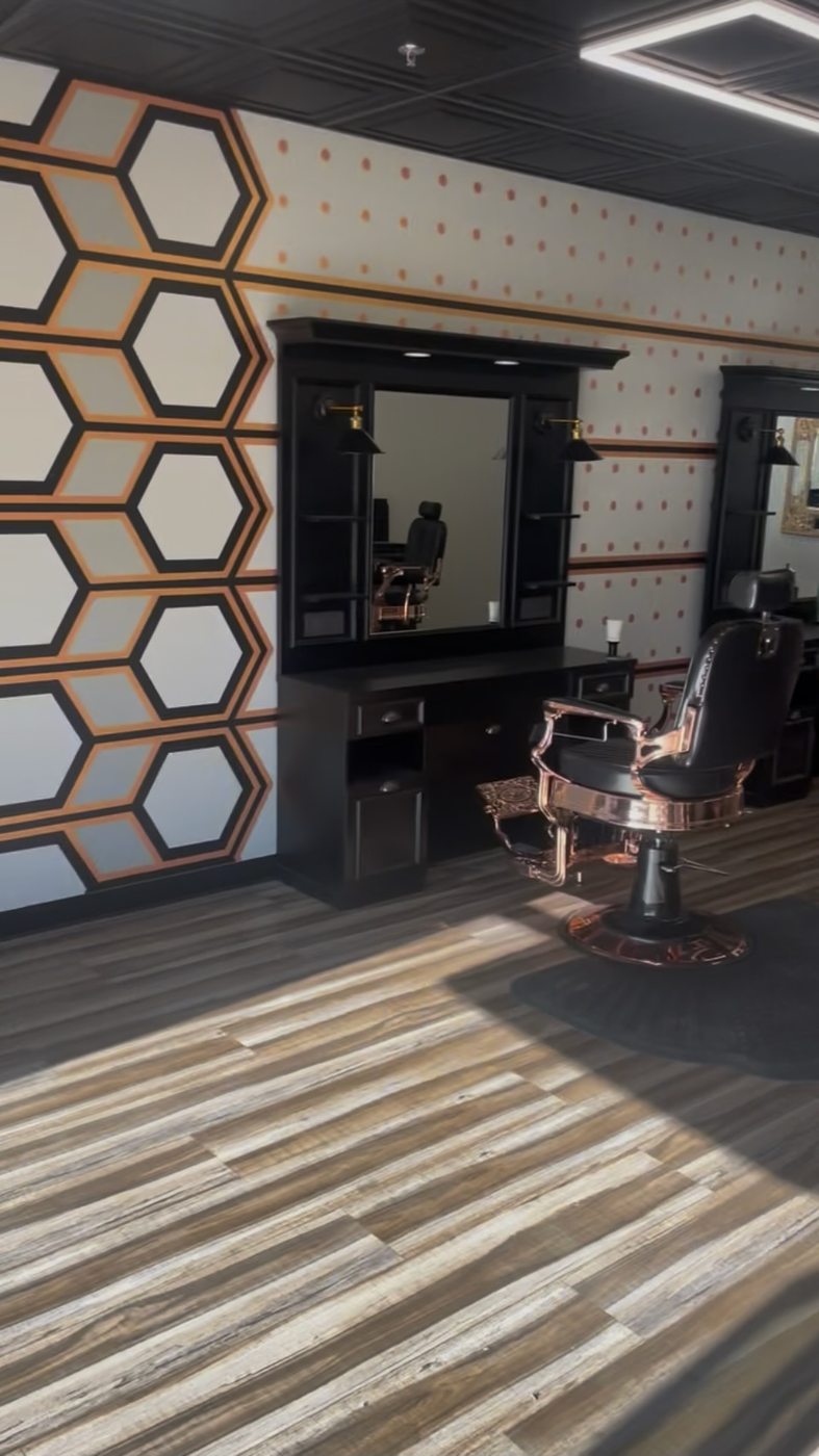 Barber station beside the honeycomb feature wall